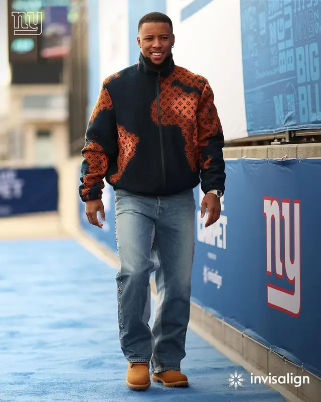 Saquon Barkley outfit in Louis Vuitton, Kapital, and Timberland, 2023