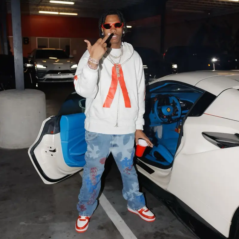Lil Baby outfit in Louis Vuitton, Balenciaga, and Nike, 2023