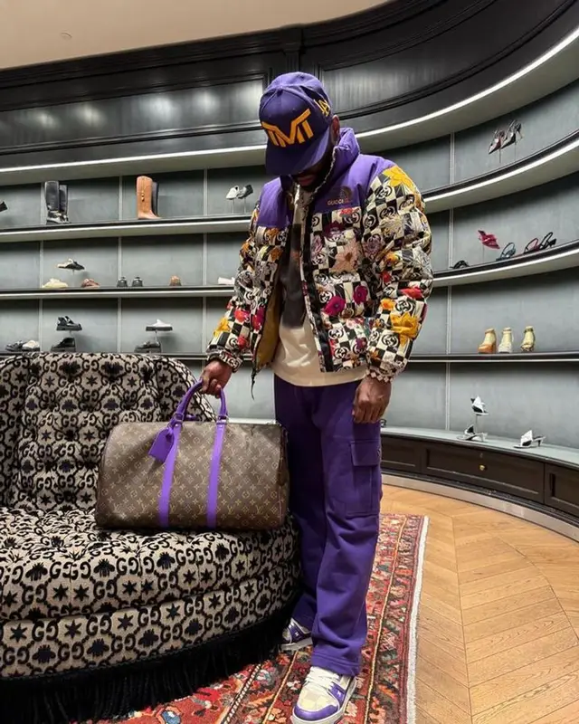 Floyd Mayweather outfit in Gucci, Louis Vuitton, and The North Face, 2024