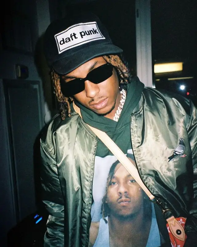 Rich The Kid outfit in Staple, Louis Vuitton, and Enfants Riches Deprimes, 2024