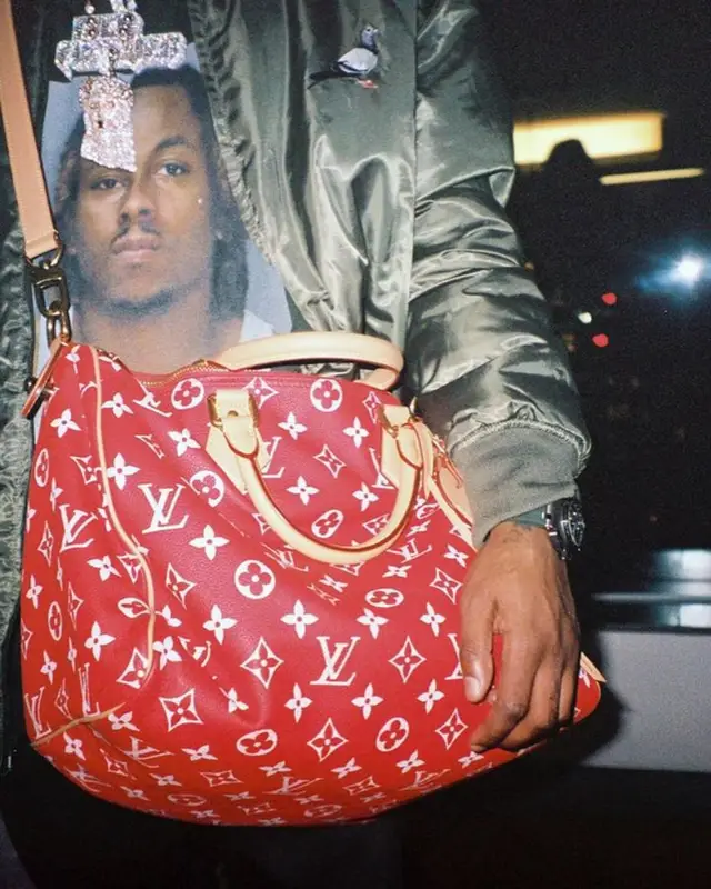 Rich The Kid outfit in Staple, Louis Vuitton, and Enfants Riches Deprimes, 2024