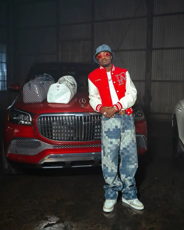Lil Tjay outfit in Goyard, Louis Vuitton, and Yayoi Kusama, 2024