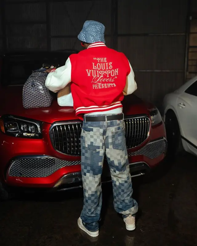 Lil Tjay outfit in Goyard, Louis Vuitton, and Yayoi Kusama, 2024
