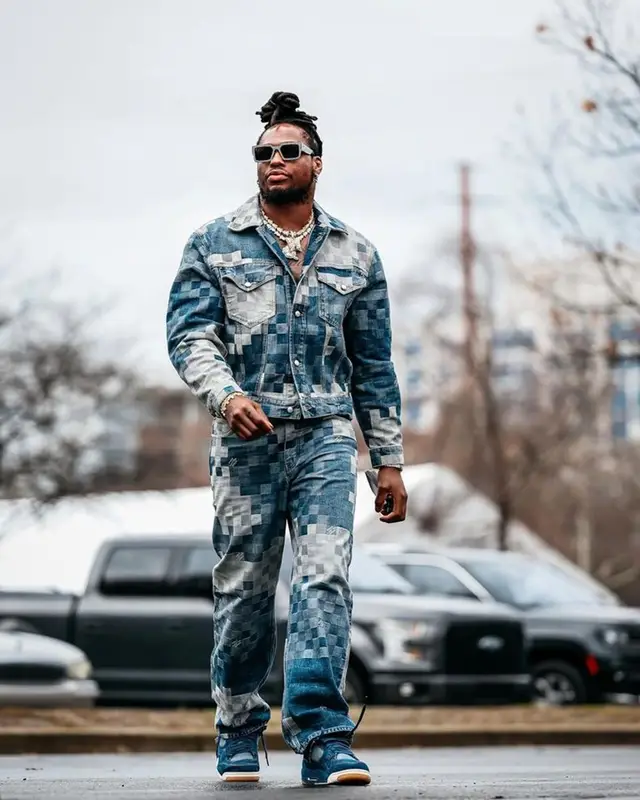 Derrick Henry outfit in Jordan, Louis Vuitton, and Levi’s, 2024