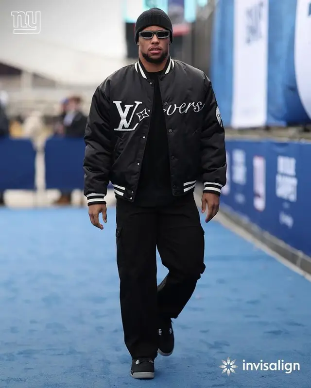 Saquon Barkley outfit in Jordan, Louis Vuitton, and Carhartt, 2024