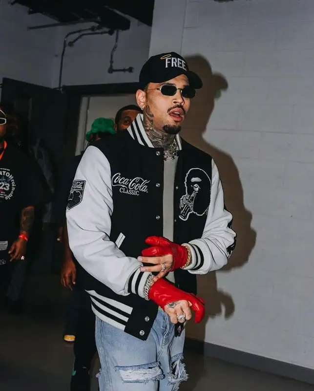 Chris Brown outfit in Bape, Pheit, and Coca-Cola, 2024