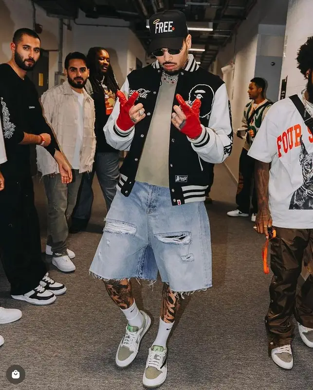 Chris Brown outfit in Bape, Pheit, and Coca-Cola, 2024