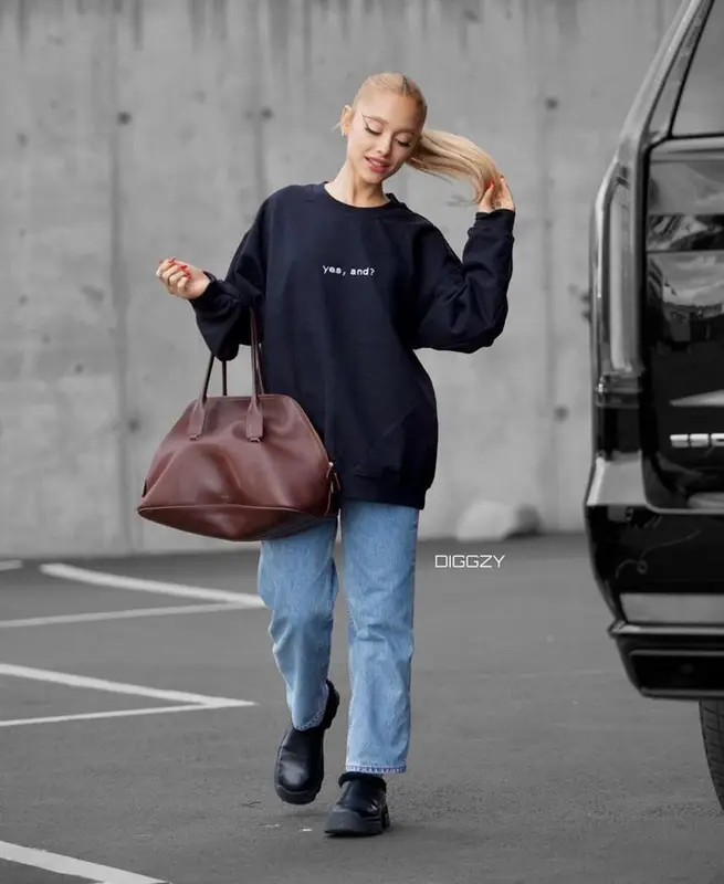 Ariana Grande outfit in Slvrlake, The Row, and Proenza Schouler, 2024