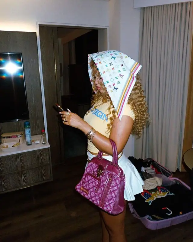 Latto outfit in Chanel, Louis Vuitton, and Takashi Murakami, 2024
