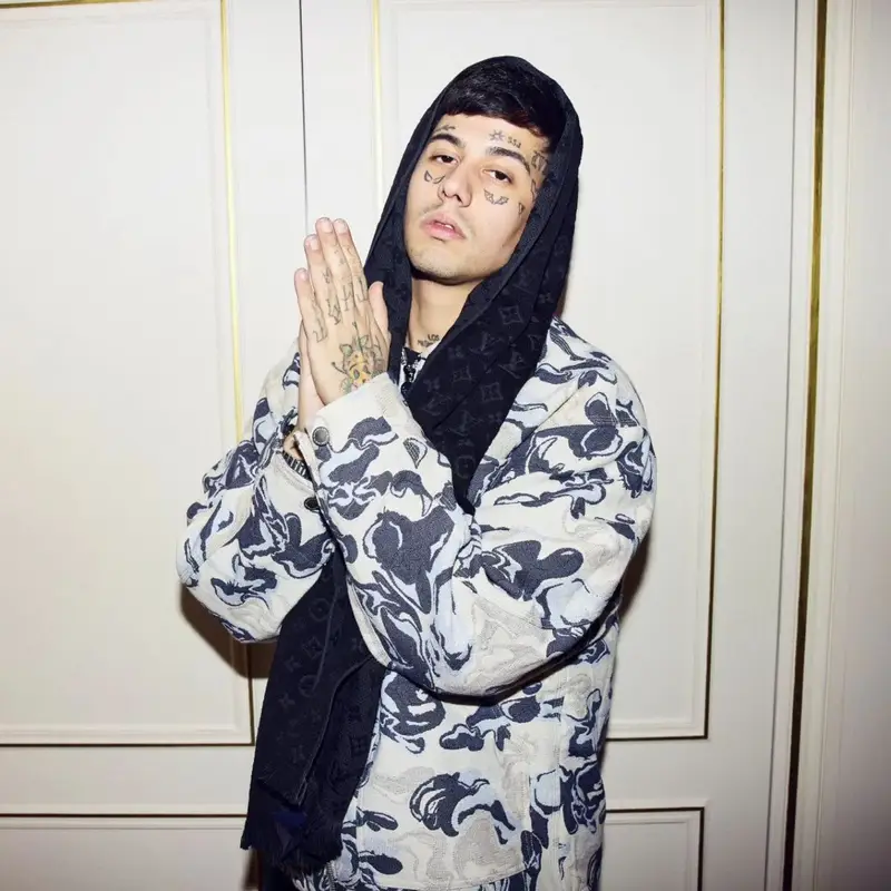 Duki outfit in Bape and Louis Vuitton, 2024