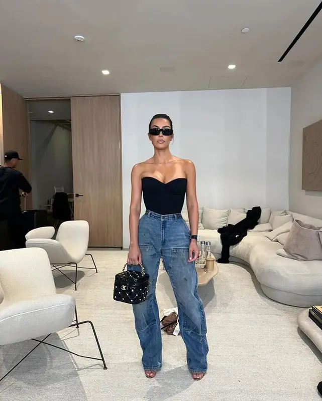 Kim Kardashian outfit in Carhartt, Hermes, and Balenciaga, 2024
