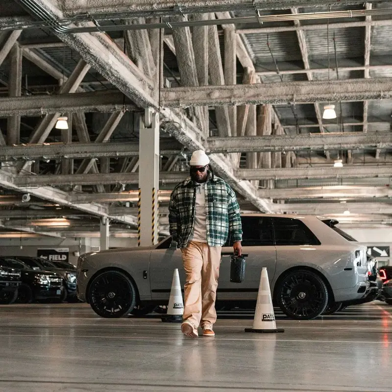 Davante Adams outfit in Amiri, Jordan, and Prada, 2024