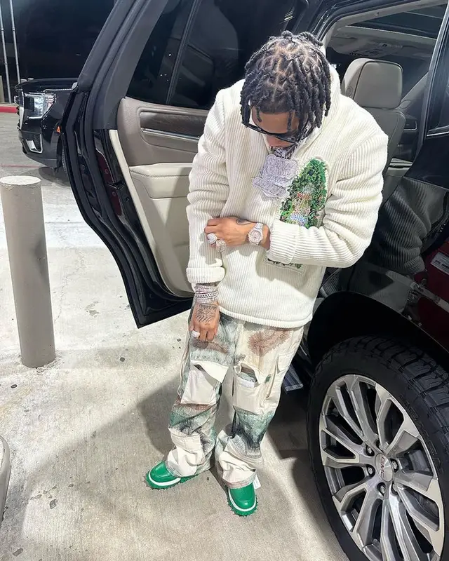 Lil Migo outfit in Who Decides War, Nike, and Gucci, 2024