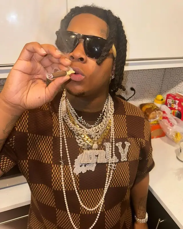 YTB Fatt outfit in Louis Vuitton and Purple Brand, 2024
