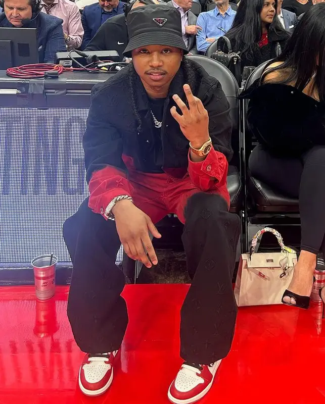 Pressa outfit in Louis Vuitton, Nike, and Prada, 2024