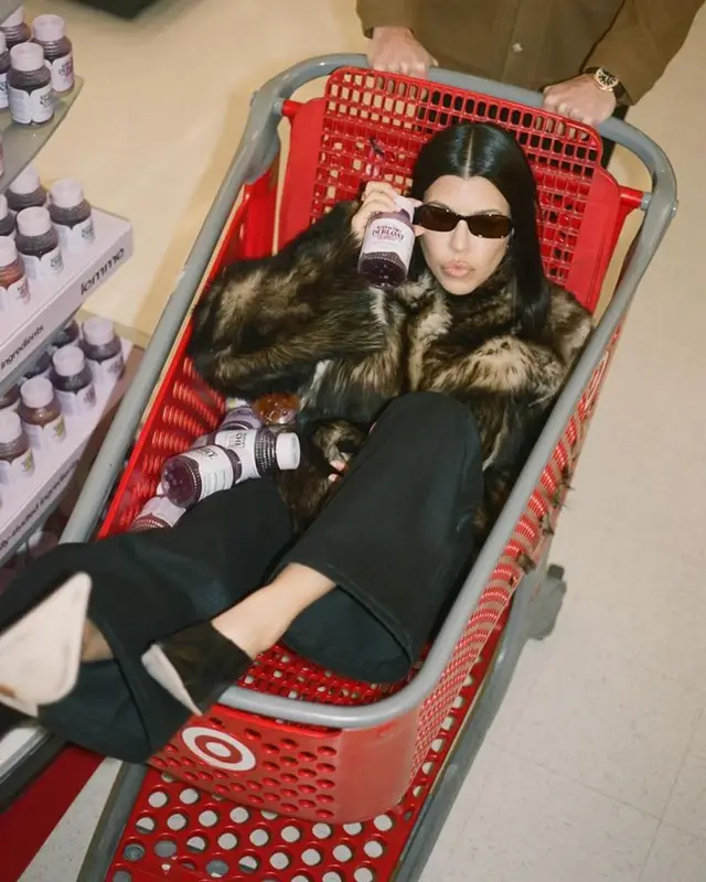 Kourtney Kardashian outfit in Nour Hammour, New Era, and By Far, 2024