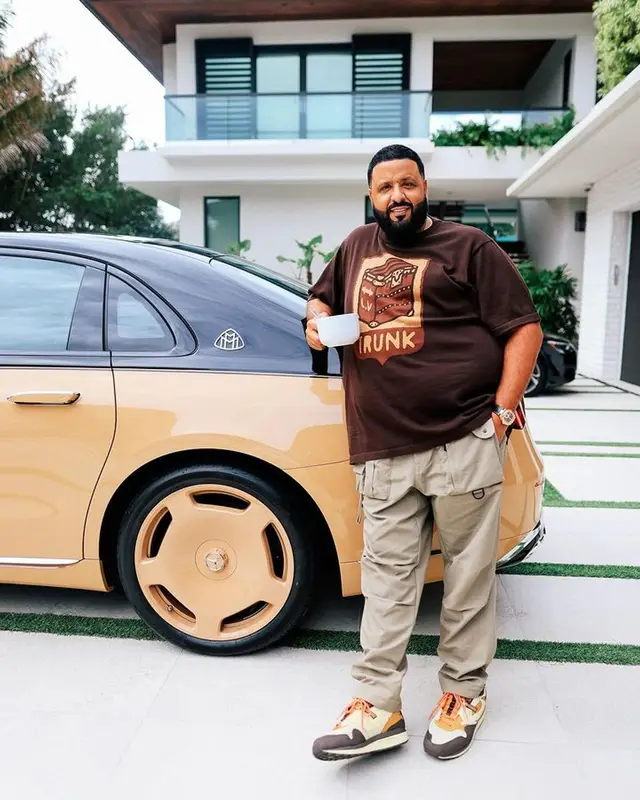 DJ Khaled outfit in Louis Vuitton, Dior, and Nike, 2024