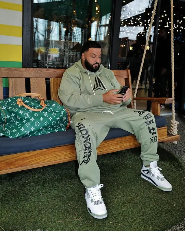 DJ Khaled outfit in Nike, Jordan, and Louis Vuitton, 2024