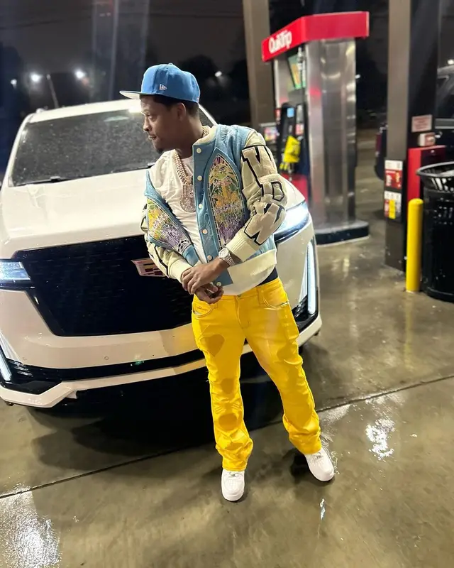 Baby Money outfit in Who Decides War, Supreme, and New Era, 2024