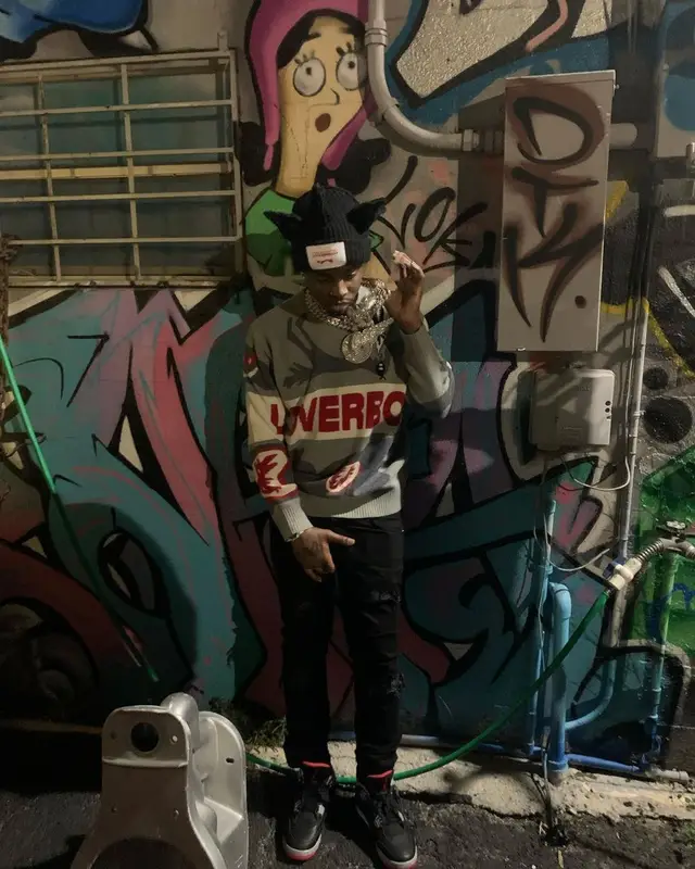 Lil Double 0 outfit in Amiri, Jordan, and Loverboy by Charles Jeffrey, 2024