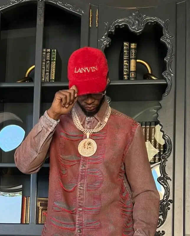 Papoose outfit in Diesel, Cartier, and Lanvin, 2024