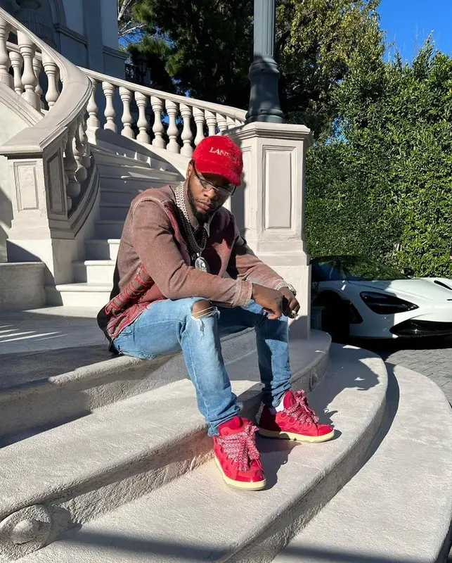 Papoose outfit in Diesel, Cartier, and Lanvin, 2024