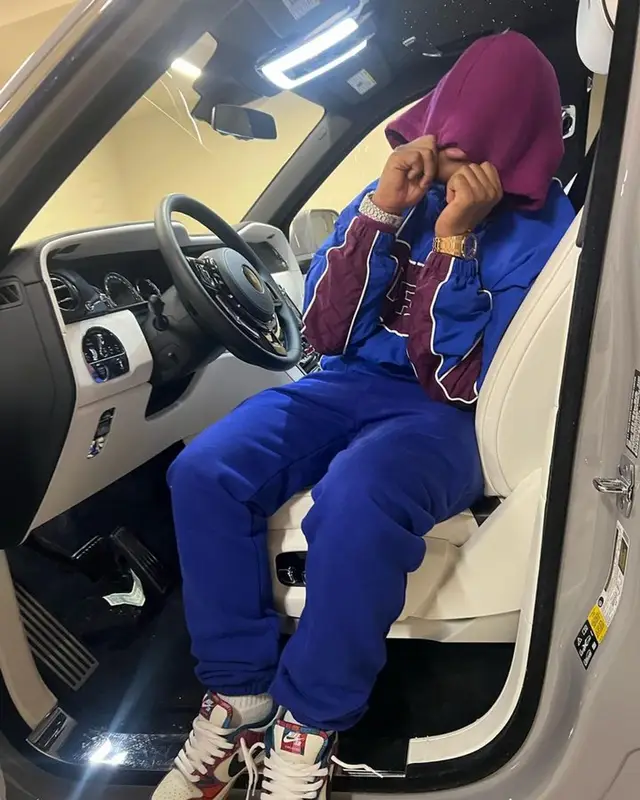 42 Dugg outfit in Supreme, The North Face, and   Kaws, 2024