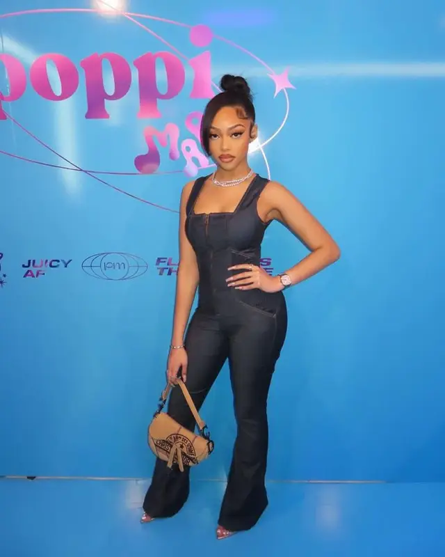 Jodie Woods outfit in Guess, Dior, and Amina Muaddi, 2024