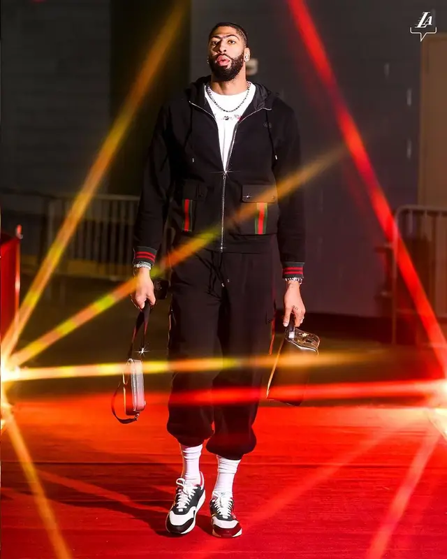 Anthony Davis outfit in Gucci, Nike, and LeBron James Merch, 2024