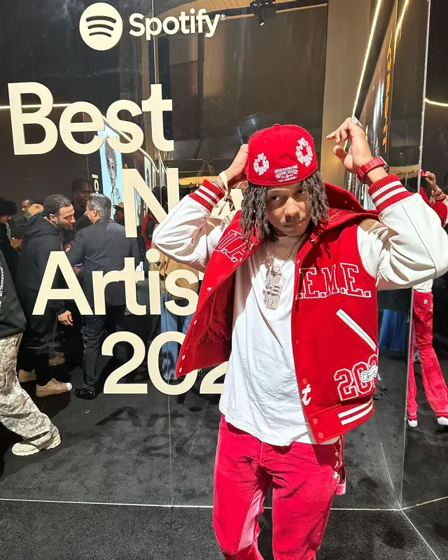 Skilla Baby outfit in Supreme, New Era, and Denim Tears, 2024