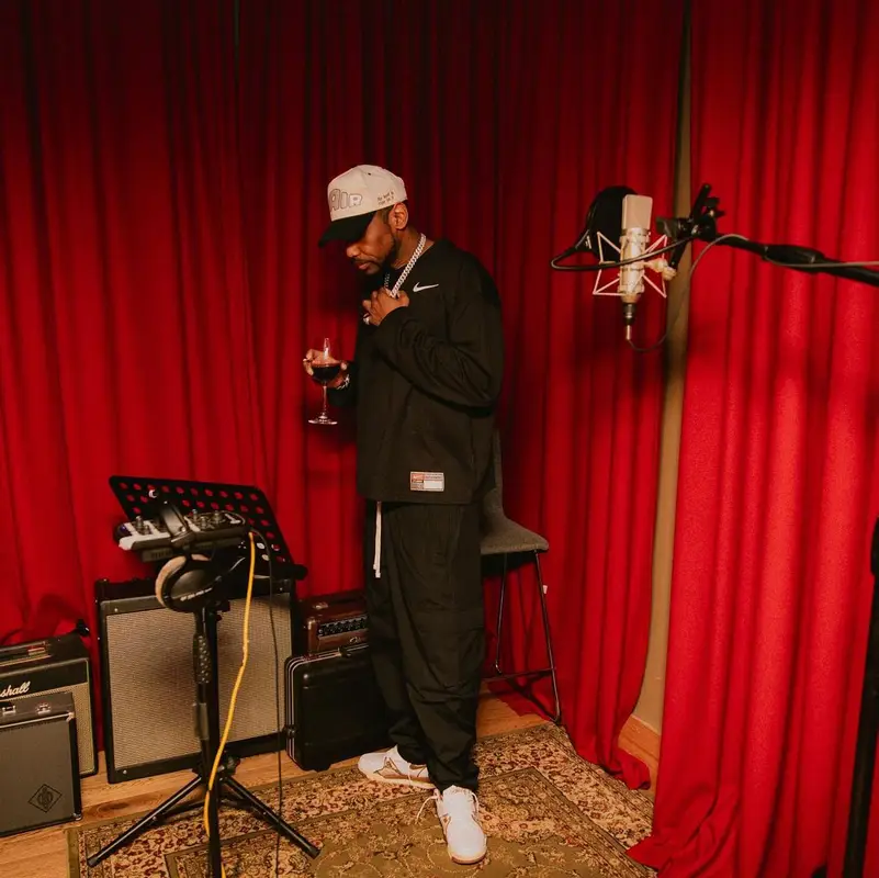 Fabolous outfit in Nike, Celine, and Stussy, 2024