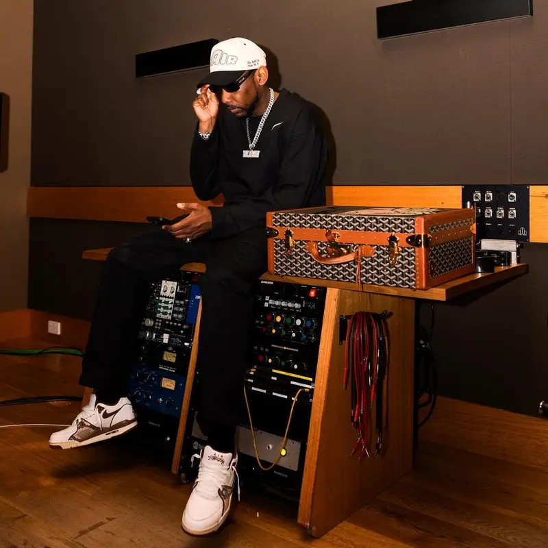 Fabolous outfit in Nike, Celine, and Stussy, 2024