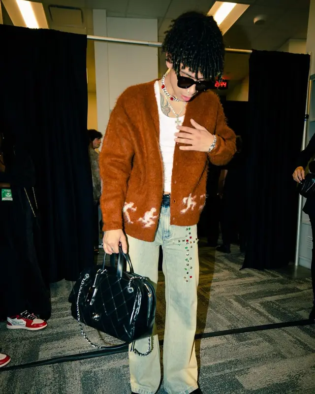 Iann Dior outfit in KidSuper, Chanel, and Gucci, 2024