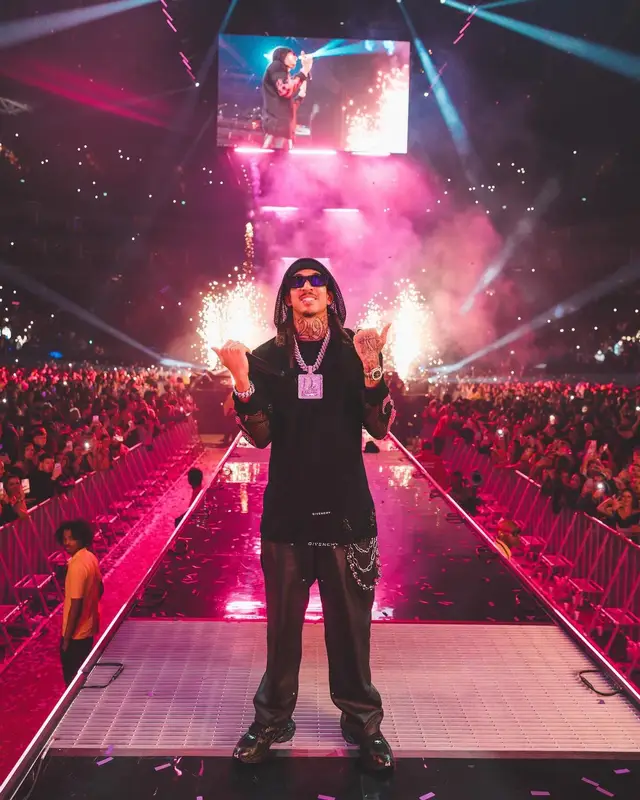 Young Adz outfit in Givenchy, Balenciaga, and Prada, 2024