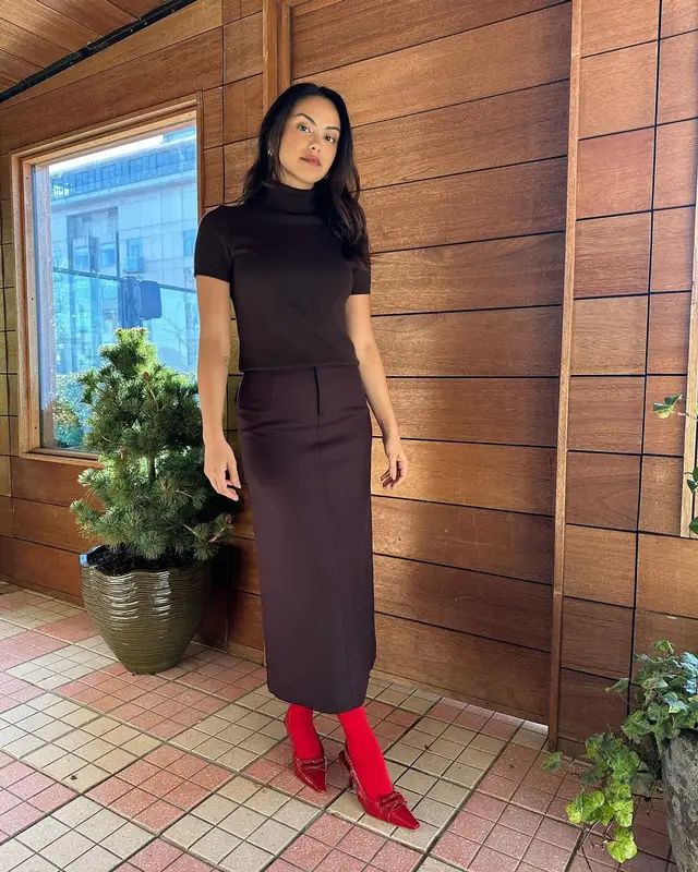 Camila Mendes outfit in Sandy Liang, Prada, and Reformation, 2024