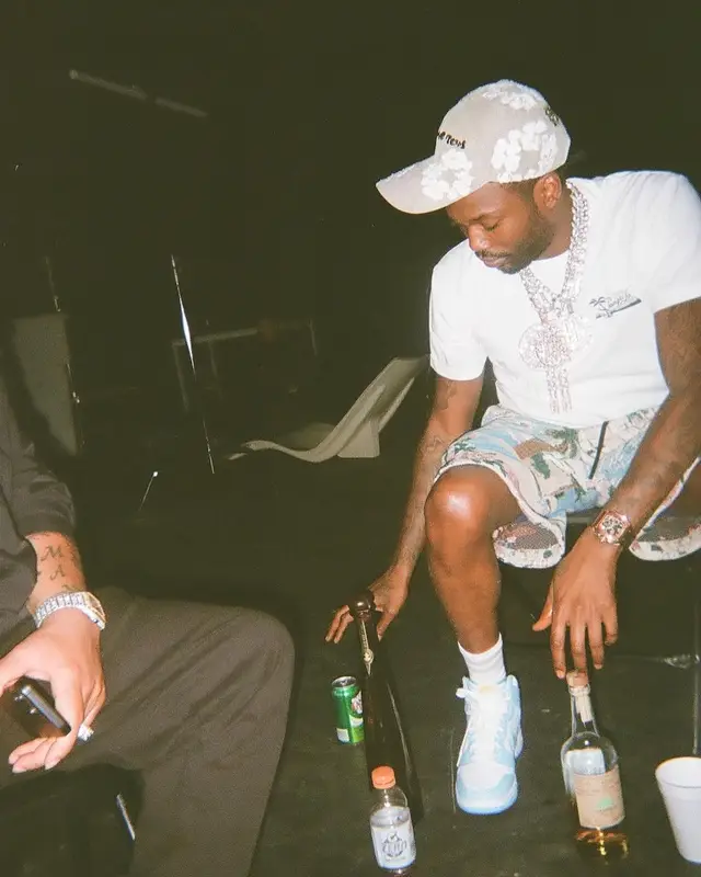 Meek Mill outfit in Amiri, Readymade, and Denim Tears, 2024
