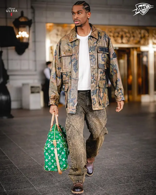 Shai outfit in Fubu, Timberland, and Louis Vuitton, 2024