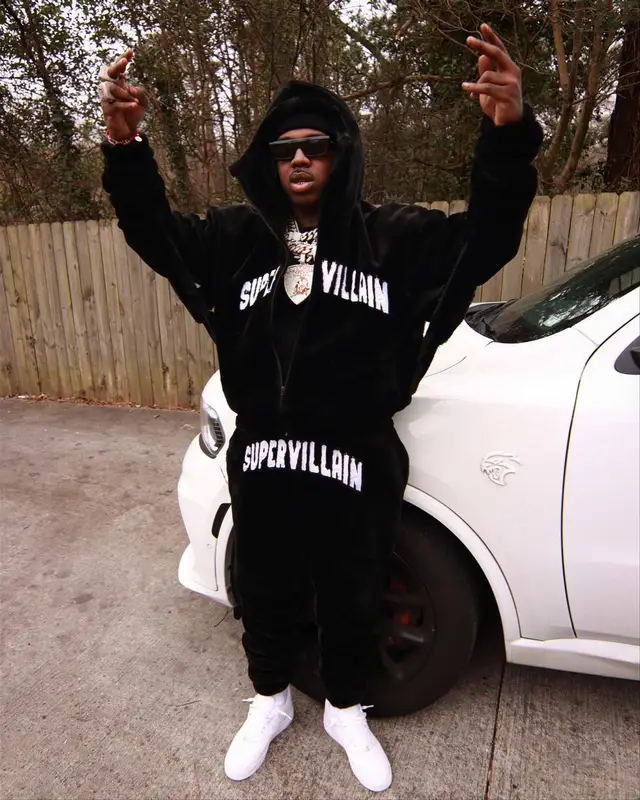 EST Gee outfit in Supervillain, Nike, and Celine, 2024