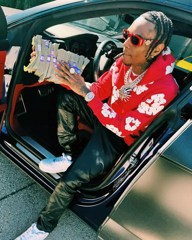 Soulja Boy outfit in Denim Tears, Nike, and Versace, 2024