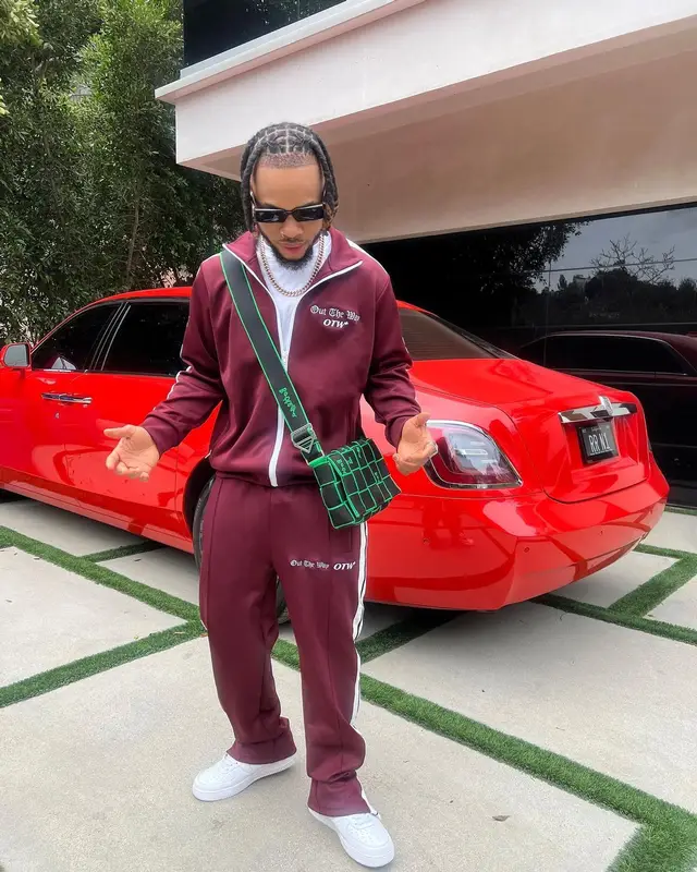 Poco Lee outfit in Nike, Bottega Veneta, and Dolce & Gabbana, 2024