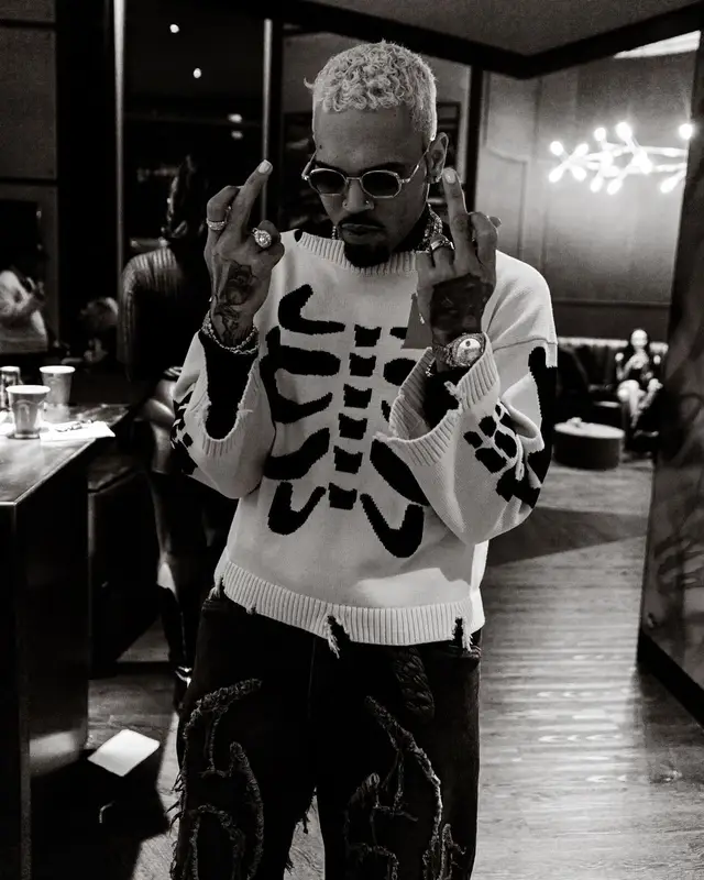 Chris Brown outfit in Loverboy by Charles Jeffrey, Drop Dead, and Rick Owens, 2024