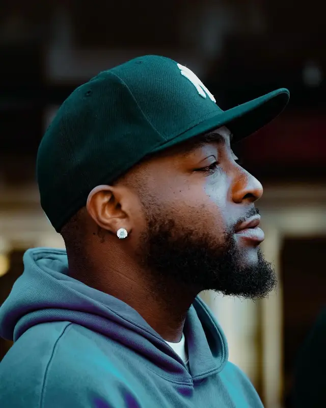 Davido outfit in Puma, New Era, and Pleasures, 2024