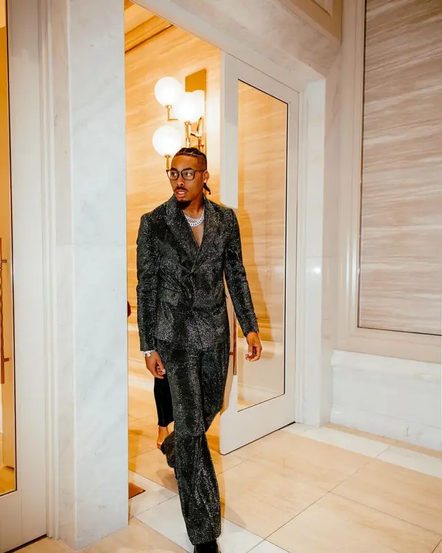 Justin Jefferson outfit in Amiri, Givenchy, and Oakley, 2024