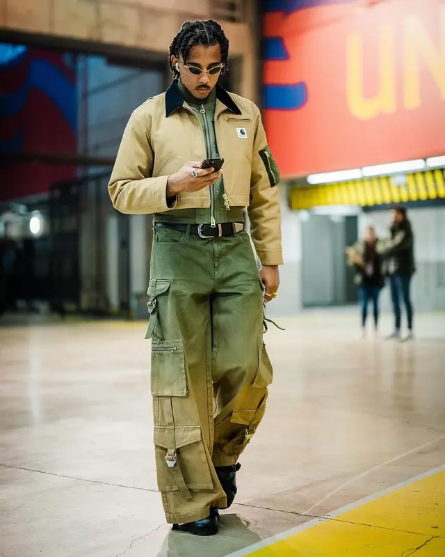 Jules Kounde outfit in Carhartt, Louis Vuitton, and Sacai, 2024