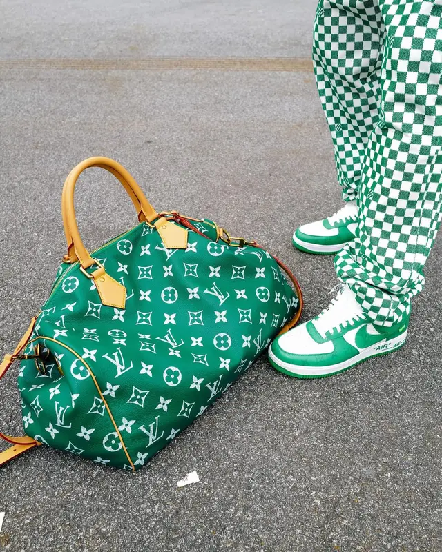 DJ Khaled outfit in Louis Vuitton, Nike, and Cartier, 2024