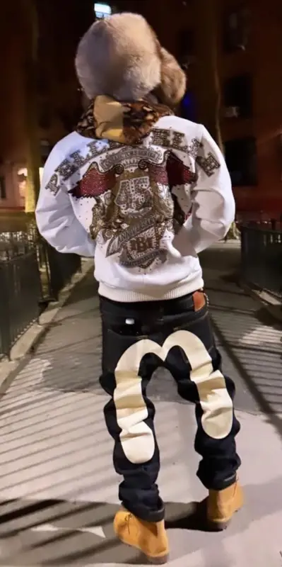 Playboi Carti outfit in Evisu, Timberland, and Akeno, 2024