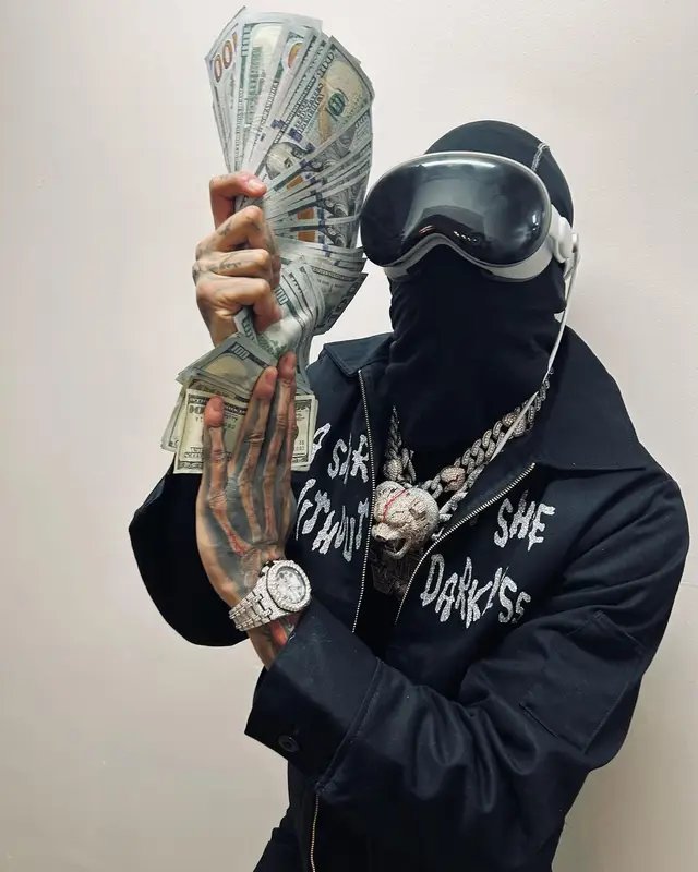 NLE Choppa outfit in Dickies, Apple, and Nike, 2024