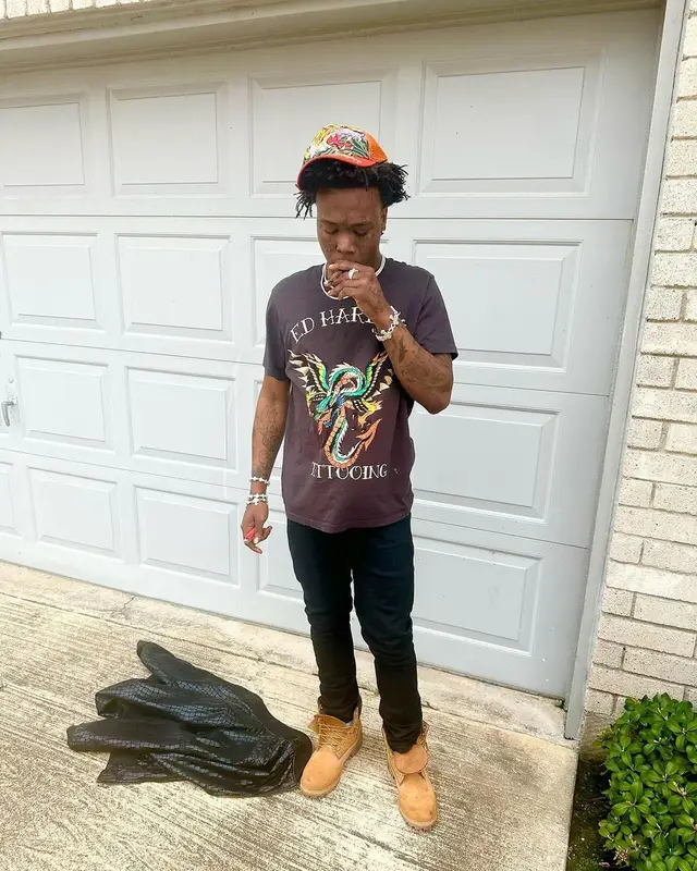 2KBABY outfit in Amiri, Timberland, and Ed Hardy, 2024