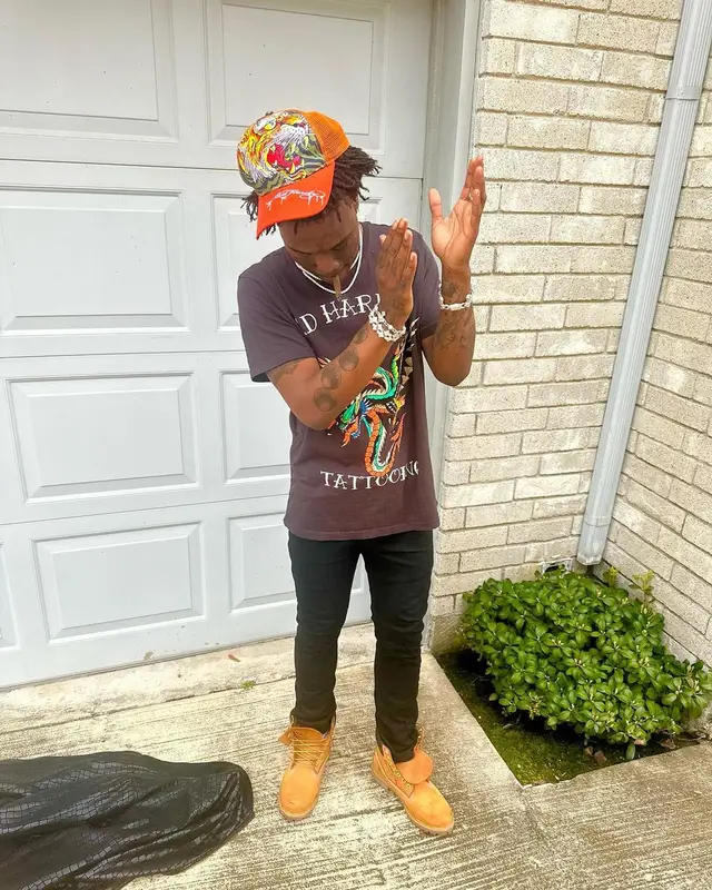 2KBABY outfit in Amiri, Timberland, and Ed Hardy, 2024