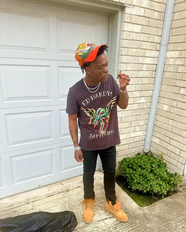 2KBABY outfit in Amiri, Timberland, and Ed Hardy, 2024